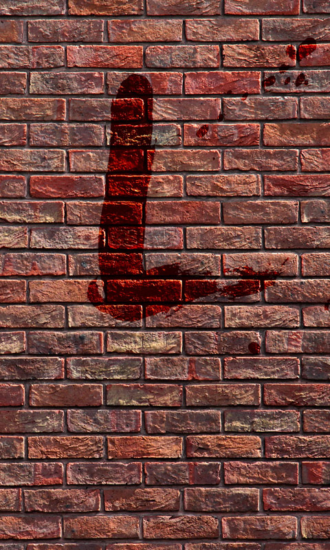 Blutiges L an einer Backsteinmauer