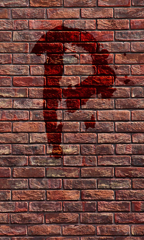 Blutiges P an einer Backsteinmauer