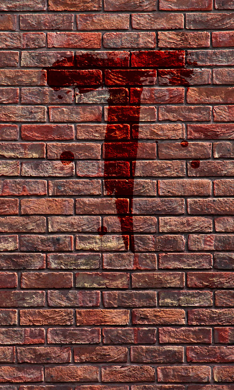 Blutiges T an einer Backsteinmauer