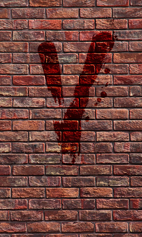 Blutiges V an einer Backsteinmauer