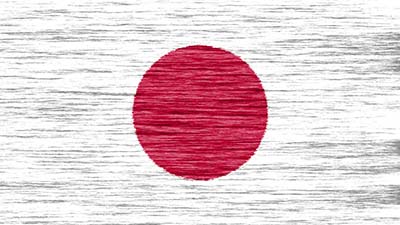 Japan Nationalflagge zeigt auf weißem Grund einen mittig angeordneten großen zinnoberroten Kreis als Sonnensymbol