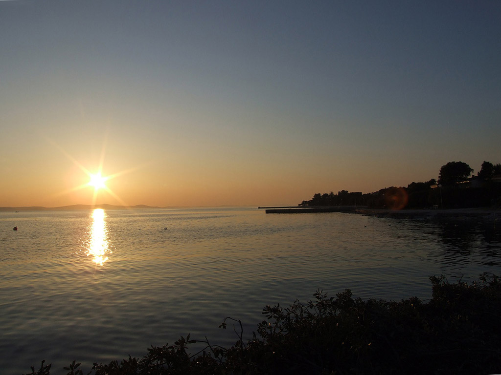 Sonnenuntergang am Meer - Kostenloses Hintergrundbild